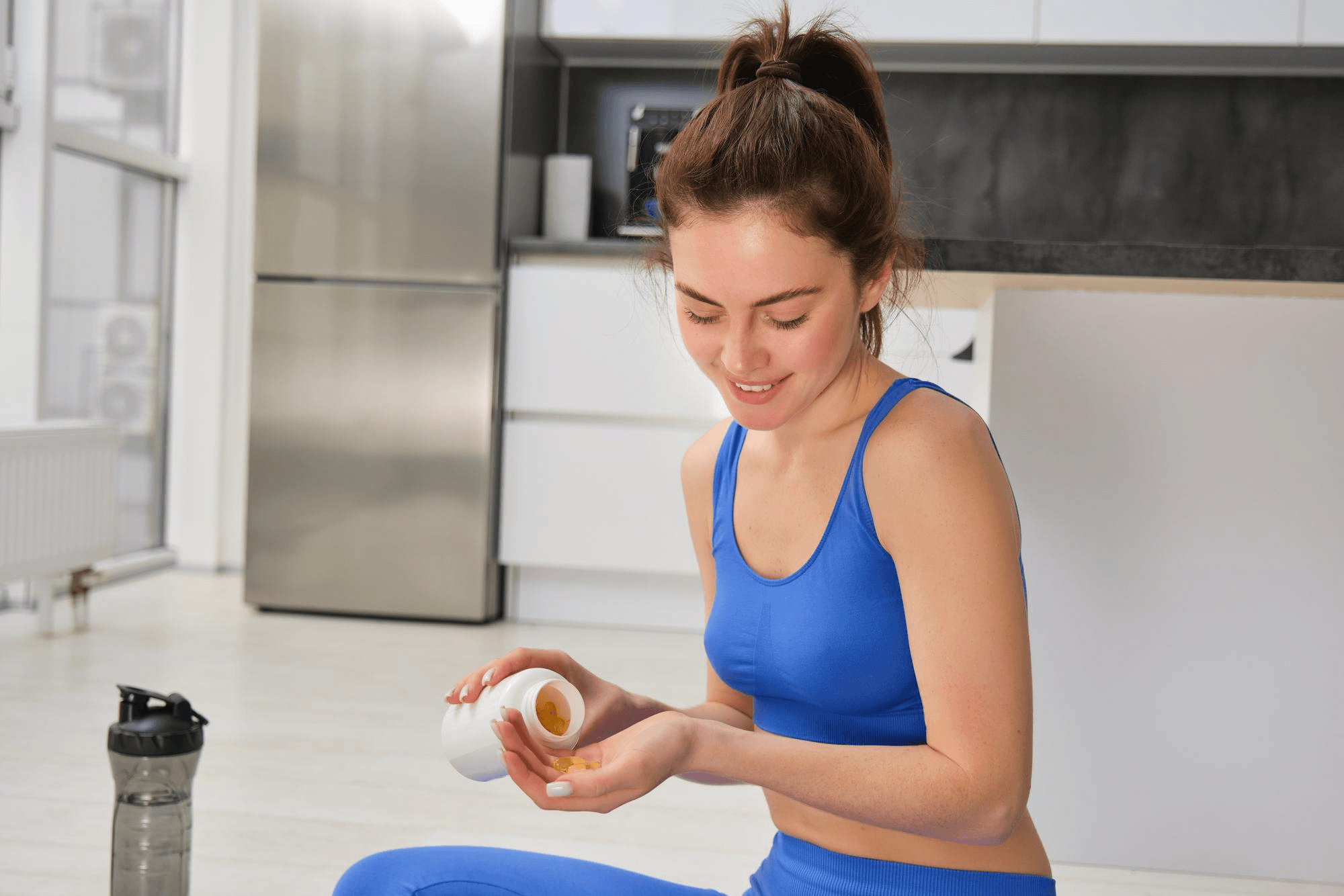 Woman taking calcium supplements.